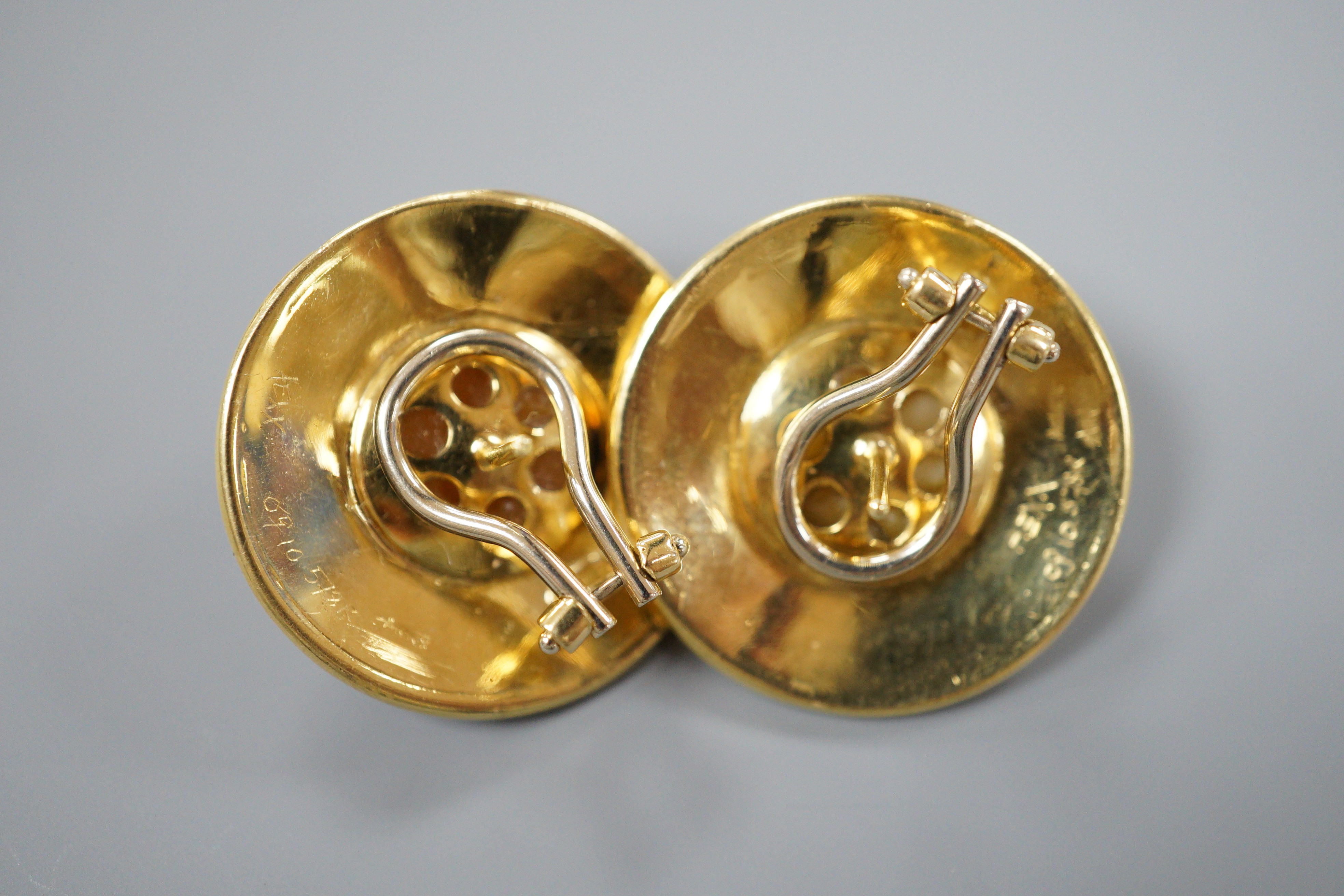 A modern pair of 18ct gold mabe pearl and blue enamel set disc earrings, diameter 25mm, gross weight 17.4 grams.